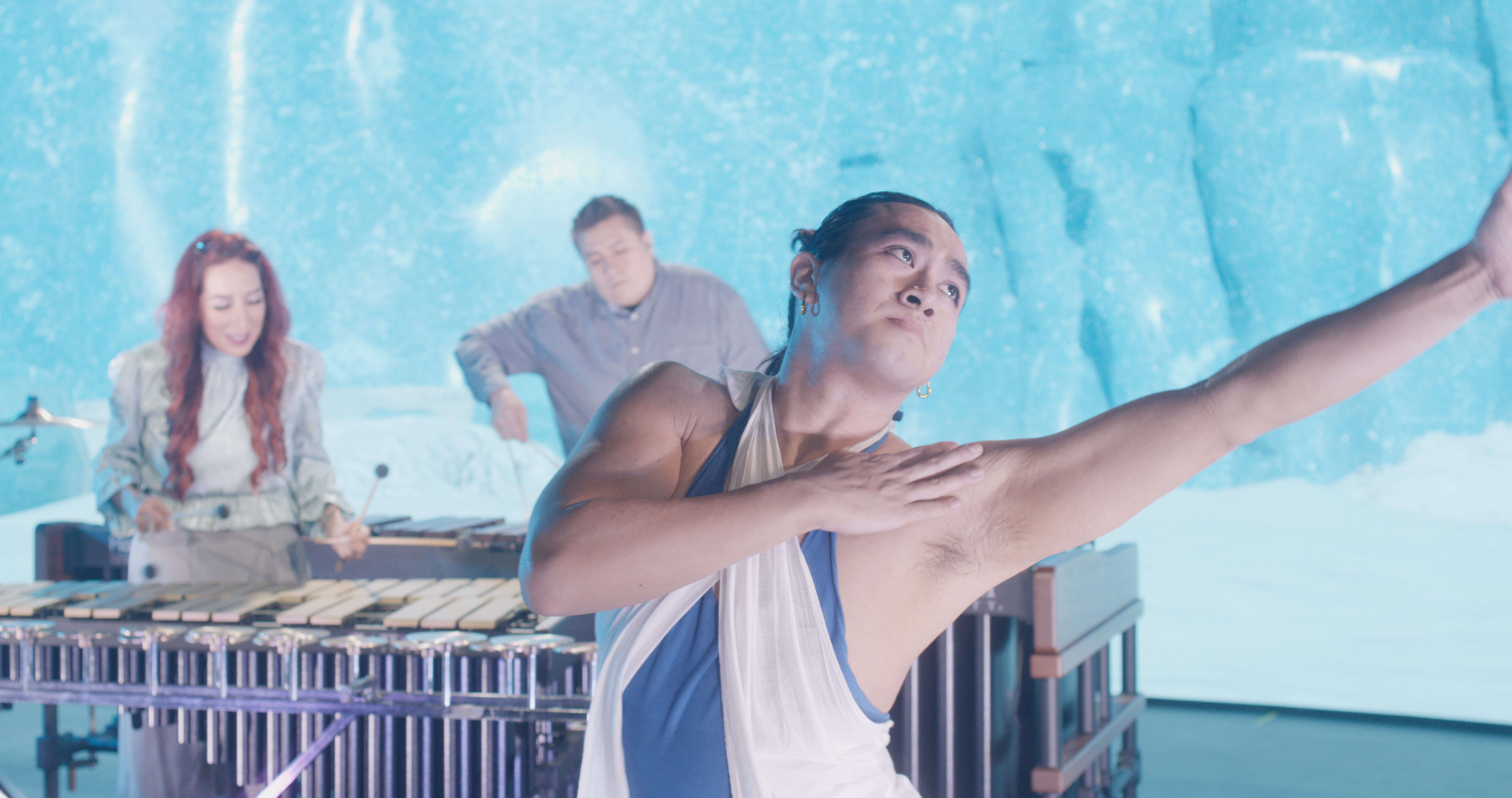 Still of dancer during the day scene.